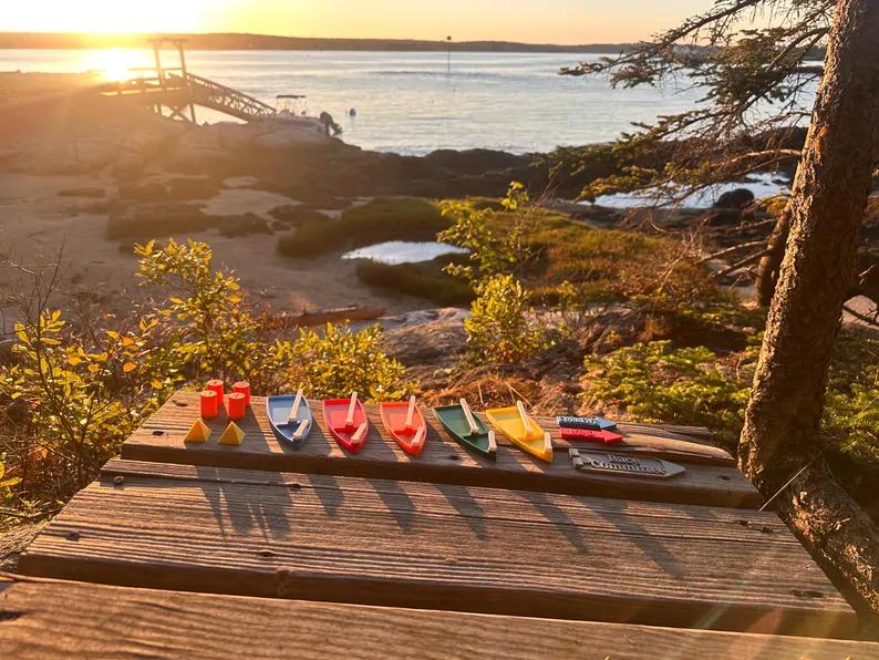 Full kit laid out on a dock at golden hour sunset