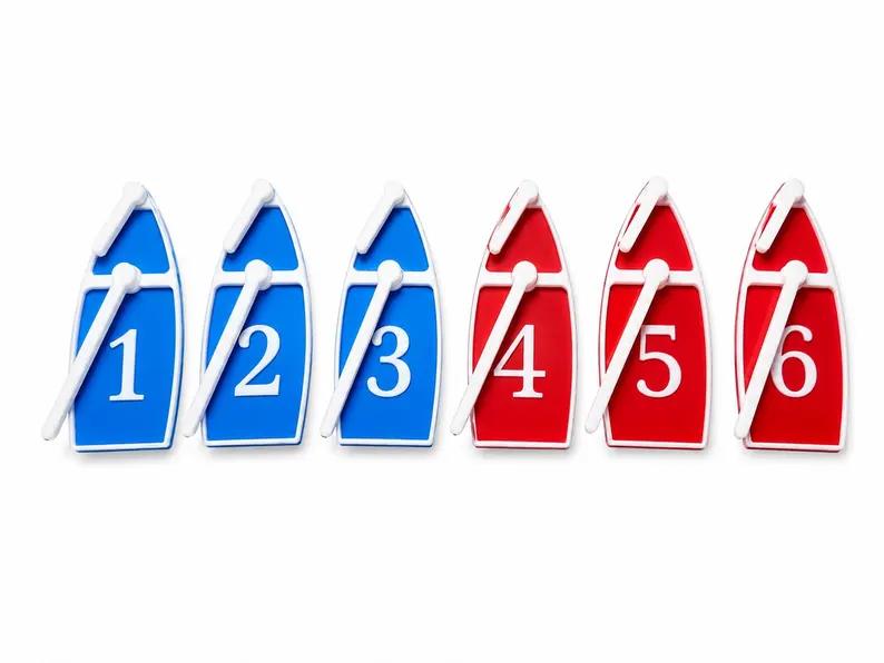 Six color-coded magnetic boat tokens — 3 blue, 3 red